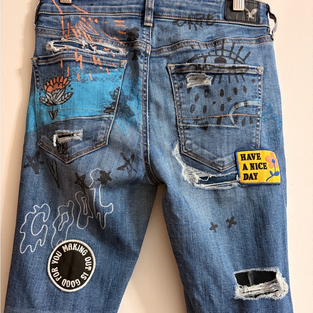 Distressed Blue Graphic Women’s Jeans with Patch & Embroidery - Picture 8 of 10